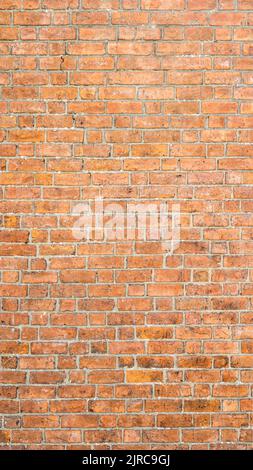 brick wall background. vertical photo of a brick wall Stock Photo