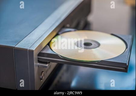 CD and VHS player. playing old CDs, old electrical and electronic devices, old-fashioned media player. Stock Photo