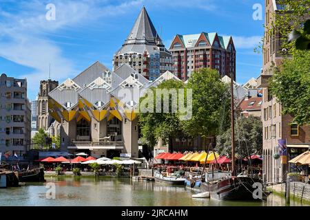 Rotterdam, Netherlands - August 2022: Exteror  view of the Cube Houses on the waterfront of the harbour in the city centre. The architect is Piet Blom Stock Photo