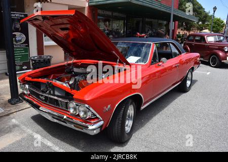 A vintage Chevrolet Chevelle SS396 with a 572 Crate Engine installed on display at a car show. Stock Photo