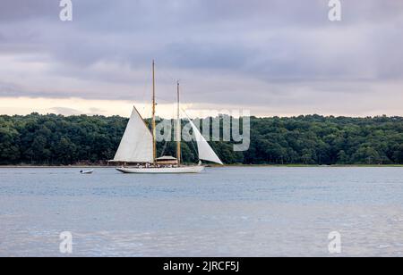 Sail boat off the coast of Shelter Island, NY Stock Photo