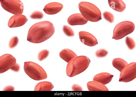 Falling peanut isolated on white background, selective focus Stock Photo