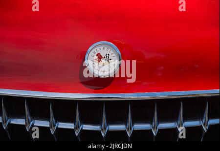 The front of a restored antique Chevrolet sedan at an antique auto show and parade on Cape Cod, USA Stock Photo