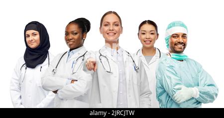 international group of doctors pointing to you Stock Photo