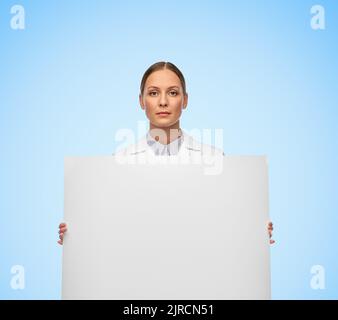 female doctor or scientist holding white board Stock Photo