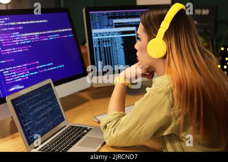Transgender programmer working in server room Stock Photo