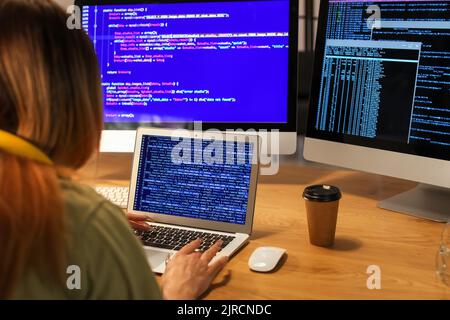 Transgender programmer working in server room Stock Photo