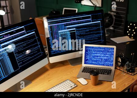 Modern workplace of programmer with computers Stock Photo