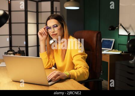 Transgender programmer working in server room Stock Photo