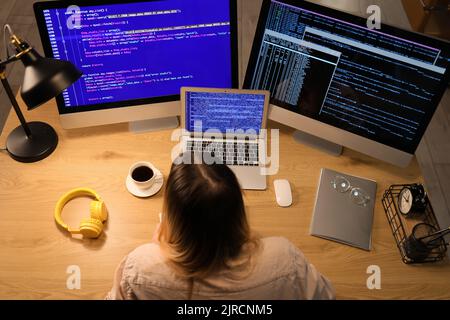 Transgender programmer working in server room Stock Photo