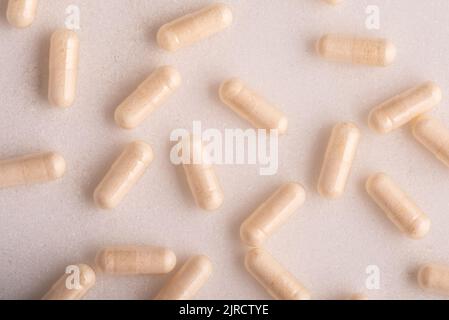Vitamin pills on clean white background Stock Photo