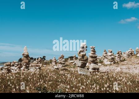 Cairn piles on beach Stock Photo
