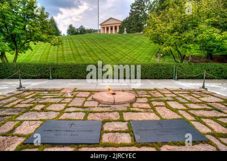 The graves and eternal flame at the Kennedy Gravesite in Arlington National Cemetery across the Potomac River from Washington, D.C. Stock Photo