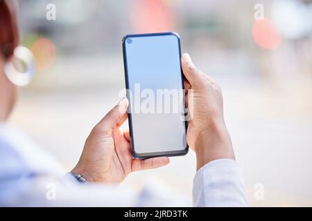 Phone, mock up screen and blank website for communication, advertising and social media marketing with woman browsing, texting or using mobile app Stock Photo