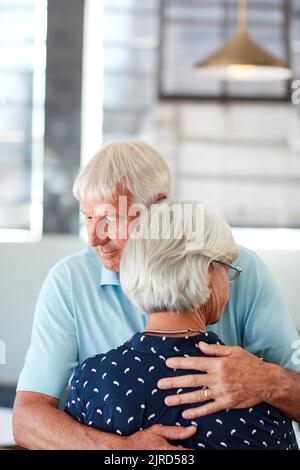 Shell always have my shoulder to lean on. a senior man embracing his wife. Stock Photo
