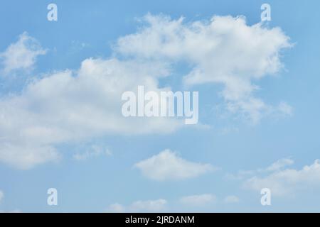 Blue sky texture with white clouds for background. Stock Photo