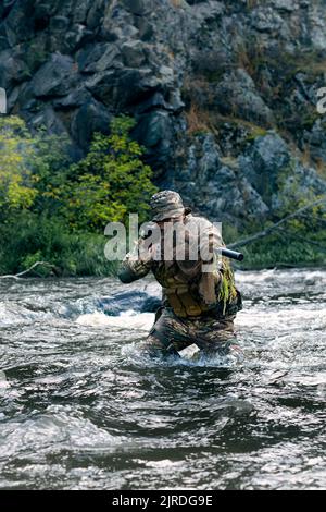 Vertical Photo Of A Mercenary Military Sniper During A Sabotage ...