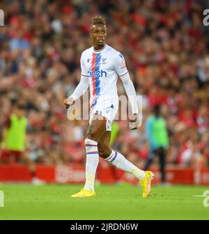 15 Aug 2022 - Liverpool v Crystal Palace - Premier League - Anfield  Crystal Palace's Wilfried Zaha during the Premier League match at Anfield. Picture : Mark Pain / Alamy Live News Stock Photo