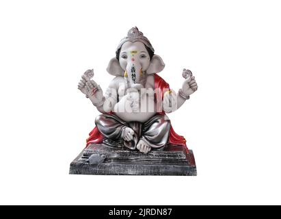 Hindu God Ganesha on white background, Ganesha Idol. Ganesh festival. Stock Photo