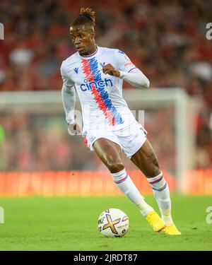 15 Aug 2022 - Liverpool v Crystal Palace - Premier League - Anfield  Crystal Palace's Wilfried Zaha during the Premier League match at Anfield. Picture : Mark Pain / Alamy Live News Stock Photo