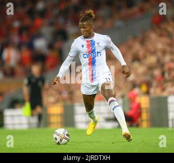 15 Aug 2022 - Liverpool v Crystal Palace - Premier League - Anfield  Crystal Palace's Wilfried Zaha during the Premier League match at Anfield. Picture : Mark Pain / Alamy Live News Stock Photo