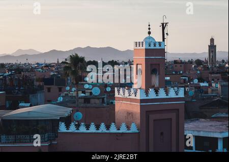 Marrakesh Medina with View on High Atlas Stock Photo