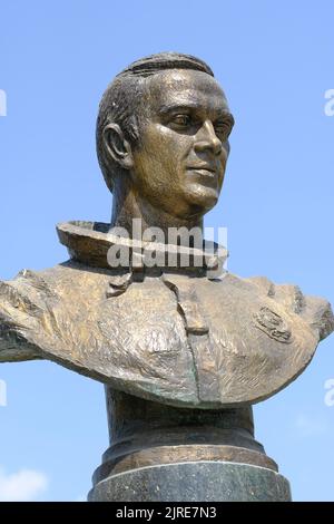 Tashkent Uzbekistan - statue of Vladimir Dzhanibekov leading Uzbek cosmonaut who spent 145 days in space beside the Memorial for Cosmonauts Stock Photo