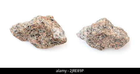 Two pieces of broken granite stones isolated on white Stock Photo