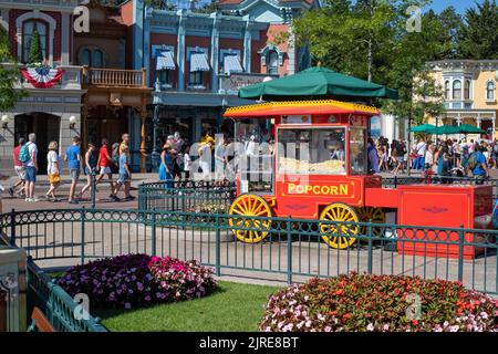 The popcorn shop at Disneyland Paris Main Street and people visiting Stock Photo