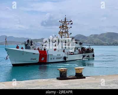 The Sentinel-class fast response cutter USCGC Oliver Henry (WPC 1140) crew arrives in Port Moresby for a port visit on Aug. 23, 2022, following a patrol in parts of the Coral Sea, and the Solomon Islands and PNG Exclusive Economic Zones. The U.S. Coast Guard is conducting a routine deployment in Oceania as part of Operation Blue Pacific, working alongside Allies, building maritime domain awareness, and sharing best practices with partner nation navies and coast guards. (U.S. Coast Guard photo by Lt. Col. Karl Wethe) Stock Photo