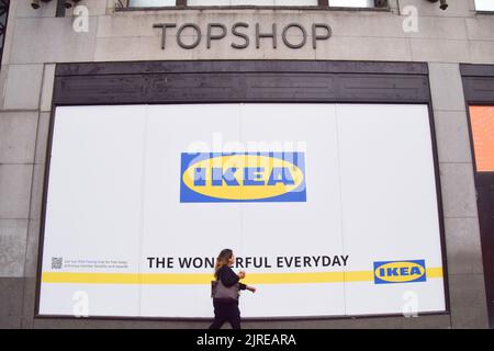 London, England, UK. 24th Aug, 2022. A woman walks past the shop window of the new IKEA store at the former site of Topshop on Oxford Street, set to open in 2023. (Credit Image: © Vuk Valcic/ZUMA Press Wire) Credit: ZUMA Press, Inc./Alamy Live News Stock Photo