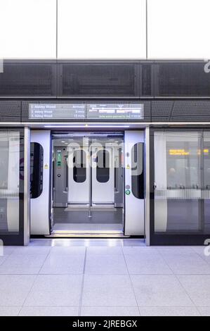 London Elizabeth Line Roundel at night Stock Photo - Alamy