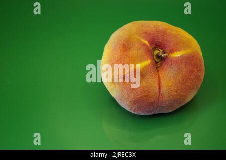 A singel Peach Fruit. Stock Photo