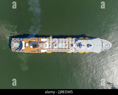 Cruise vessel Balmoral maiden call in Liepaja during Baltic sea summer cruise 2022.  Vessel approaching breakwater of Liepaja port. Aerial drone photo Stock Photo