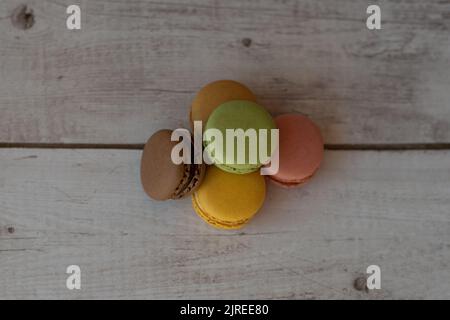 Top view of colored macaroons on white background Stock Photo