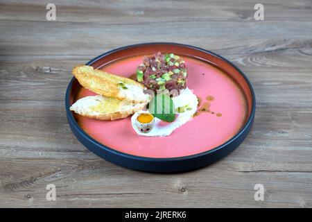 Plate with steak, quail egg with croutons and omelette. Energy breakfast Stock Photo