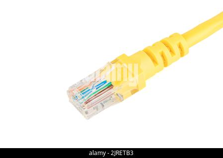 Close-up of an 8-pin RJ-45 computer connector on a yellow cable over a white background. Copy space. Stock Photo