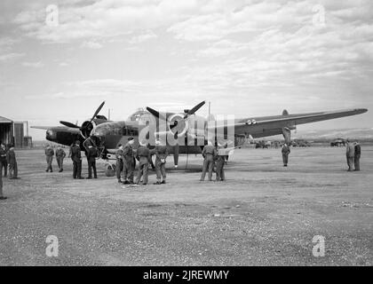 Royal Air Force Ferry Command, 1941-1943. Armstrong Whitworth Albemarle ST Mark I Series 2, P1564, of 'C' Flight, No. 511 Squadron RAF based at Lyneham, Wiltshire, attracts attention at Blida, Algeria, after completing the first forces air mail flight from the United Kingdom to North Africa. Stock Photo