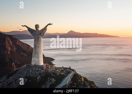 The statue of Christ the Redeemer is located in Maratea, Italy. Created from Carrara marble, and the third tallest statue of Jesus in Europe. Stock Photo