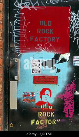 Old Rock Factory, doorway graffiti and street art, handle & letterbox, Deansgate, Blackpool , Lancs, England, FY1 1BN Stock Photo