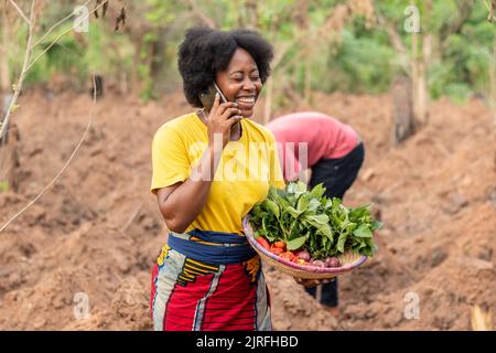 female african farmer making a phone call Stock Photo