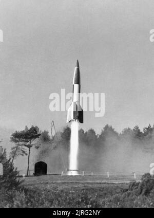 The V2 Rocket A German V2 rocket at the moment of launch during Allied tests in Germany, 10 October 1945. Stock Photo