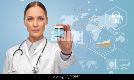 female doctor with medicine over world statistics Stock Photo