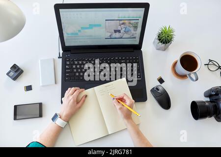 woman with video editor program on computer Stock Photo