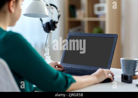 woman with laptop working at home office Stock Photo