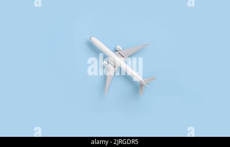 Toy plane on a blue background top view Stock Photo