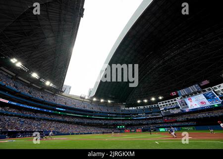The roof opens at Rogers Centre following a storm that passed over the city, during fourth inning MLB interleague baseball action between the Toronto Blue Jays and the Cincinnati Reds in Saturday, May 21, 2022. The Toronto Blue Jays will begin next season on a lengthy road trip before returning home to a renovated Rogers Centre. The Blue Jays released their schedule for the 2023 season on Wednesday. Canada's lone Major League Baseball team will open the season March 30 at St. Louis to kick off a 10-game road trip that will include series against the Kansas City Royals and Los Angeles Angels. T Stock Photo