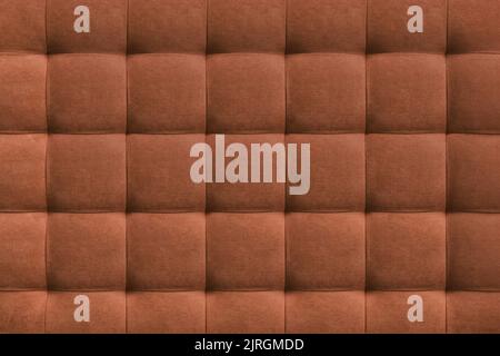 Brown suede leather background for the wall in the room. Interior design, headboards made of furniture fabric, furniture upholstery. Classic checkered Stock Photo