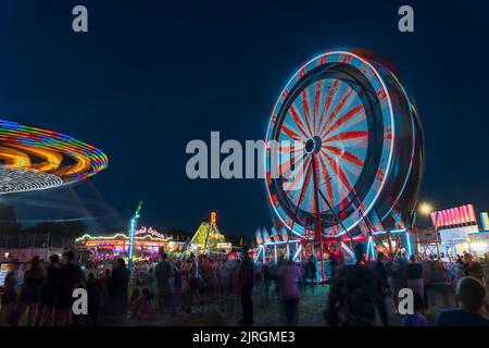 The Wonder Shows midway illuminated at night at the Harvest Festival in Winkler, Manitoba, Canada. Stock Photo