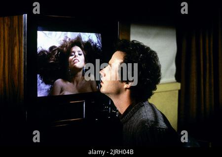 CORINNE WAHL, STEVE GUTTEBERG, AMAZON WOMEN ON THE MOON, 1987 Stock Photo